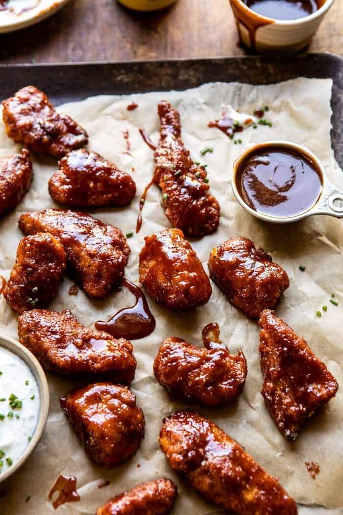 side angled close up photo of Baked Boneless Honey BBQ Chicken Wings with Spicy Ranch