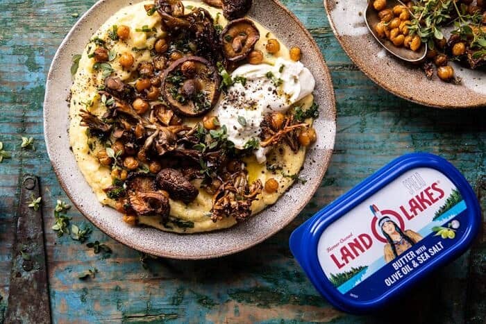 horizontal photo of Pesto Polenta with Thyme Roasted Mushrooms and Chickpeas and butter in photo 