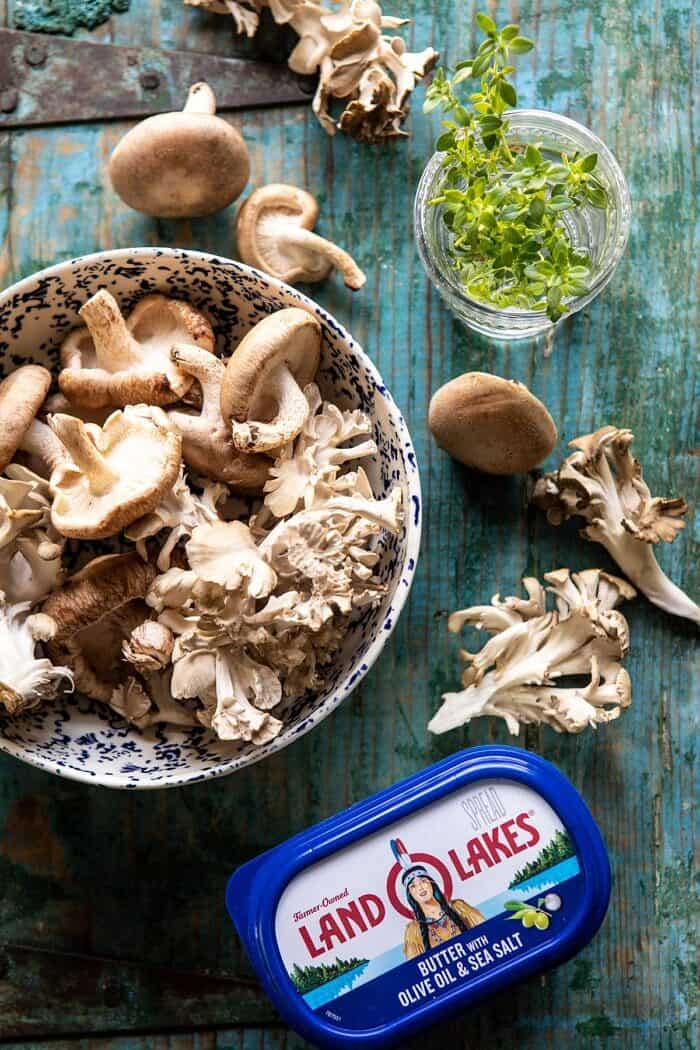 overhead photo of raw mushrooms and butter