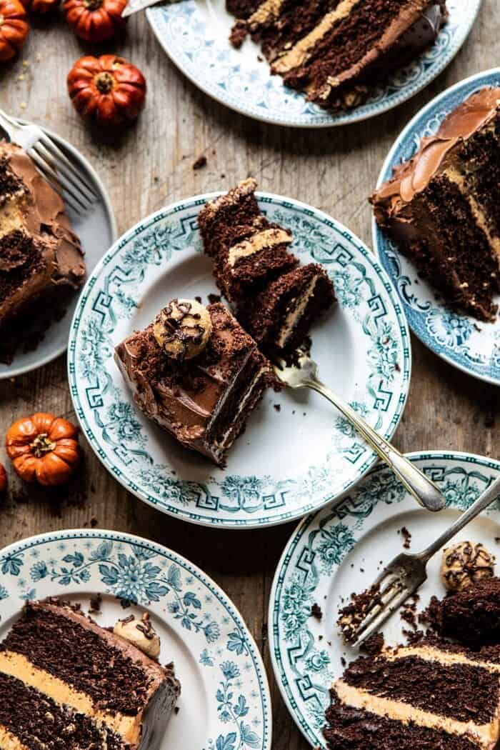 overhead photo of Pumpkin Patch Chocolate Peanut Butter Cake slices on plates 