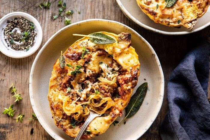 horizontal photo of Roasted Garlic Spaghetti Squash Lasagna Boats with fork in spaghetti squash