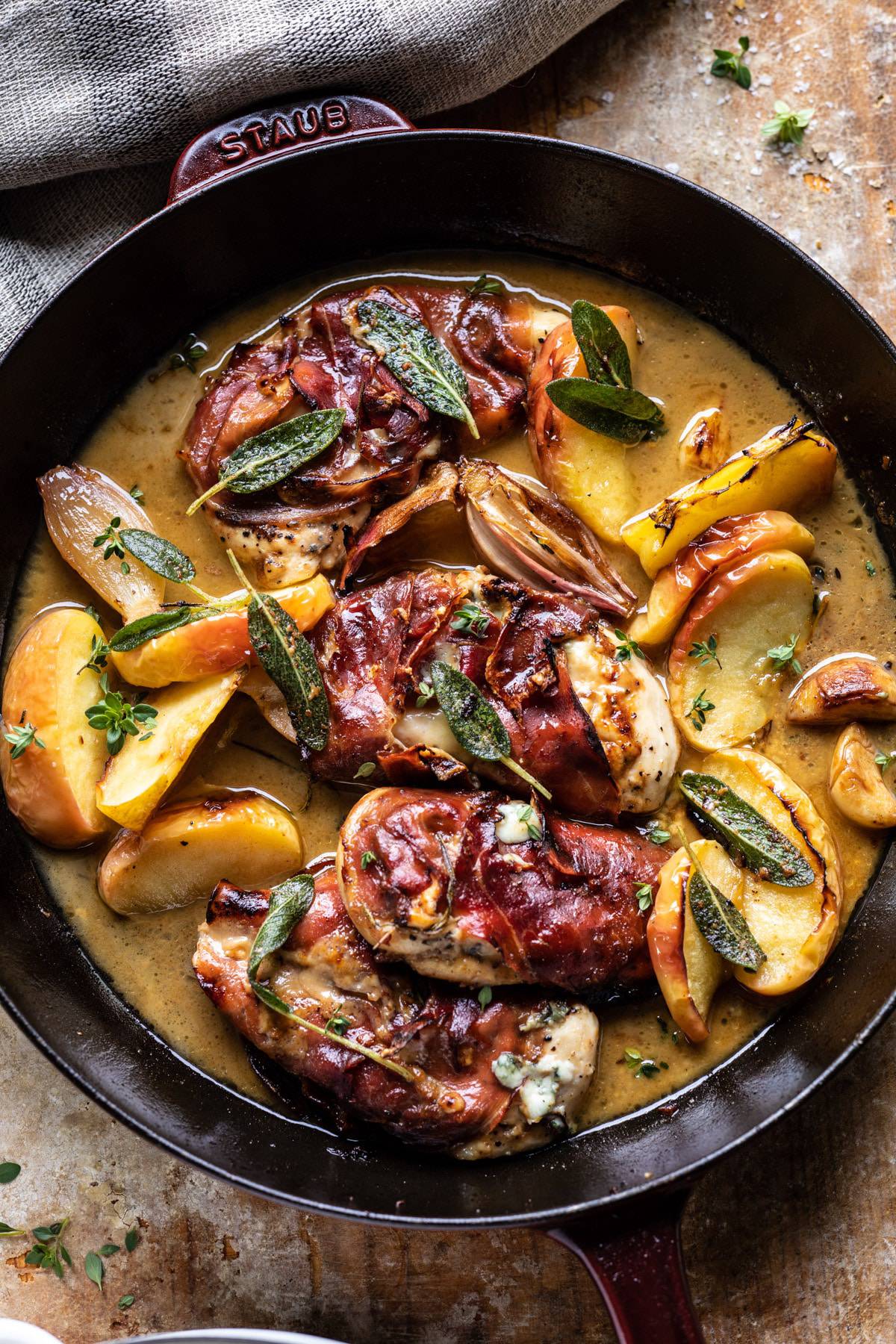 Prosciutto Apple and Sage Butter Chicken with Cider Pan Sauce | halfbakedharvest.com #chicken #apples #fallrecipes #skillet