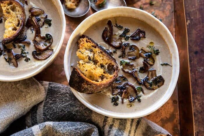 horizontal overhead photo of Cream of Mushroom Soup with Garlic Herb Breadcrumbs