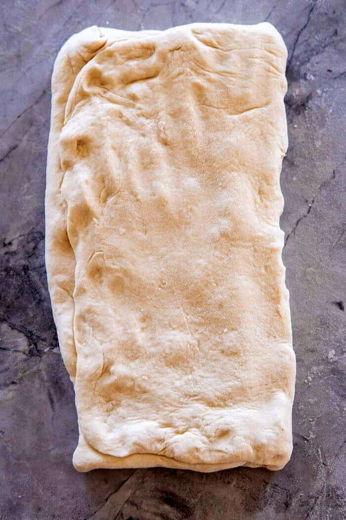 photo of dough folded into an envelope 