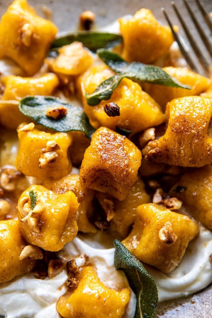 overhead super close up photo of Pumpkin Cauliflower Gnocchi with Nutty Browned Butter and Whipped Ricotta