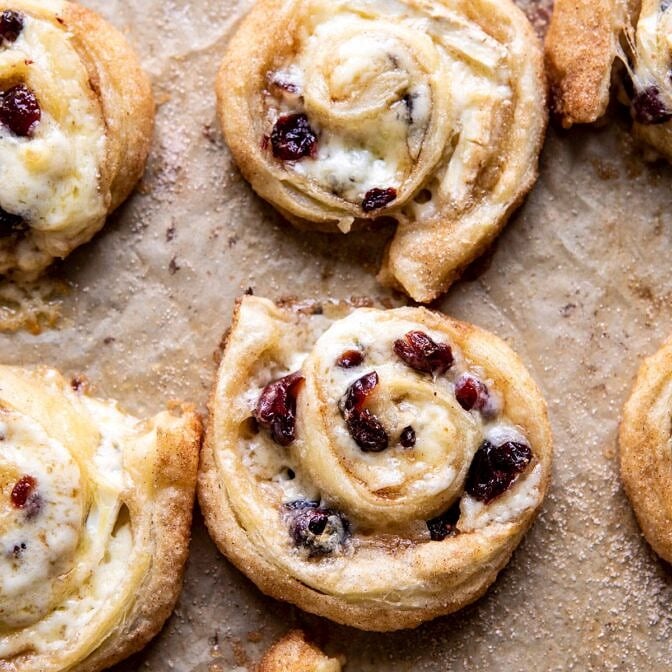 5 Ingredient Cranberry Brie Cinnamon Puff Pastry Swirls | halfbakedharvest.com #brie #cranberries #thanksgiving #christmas