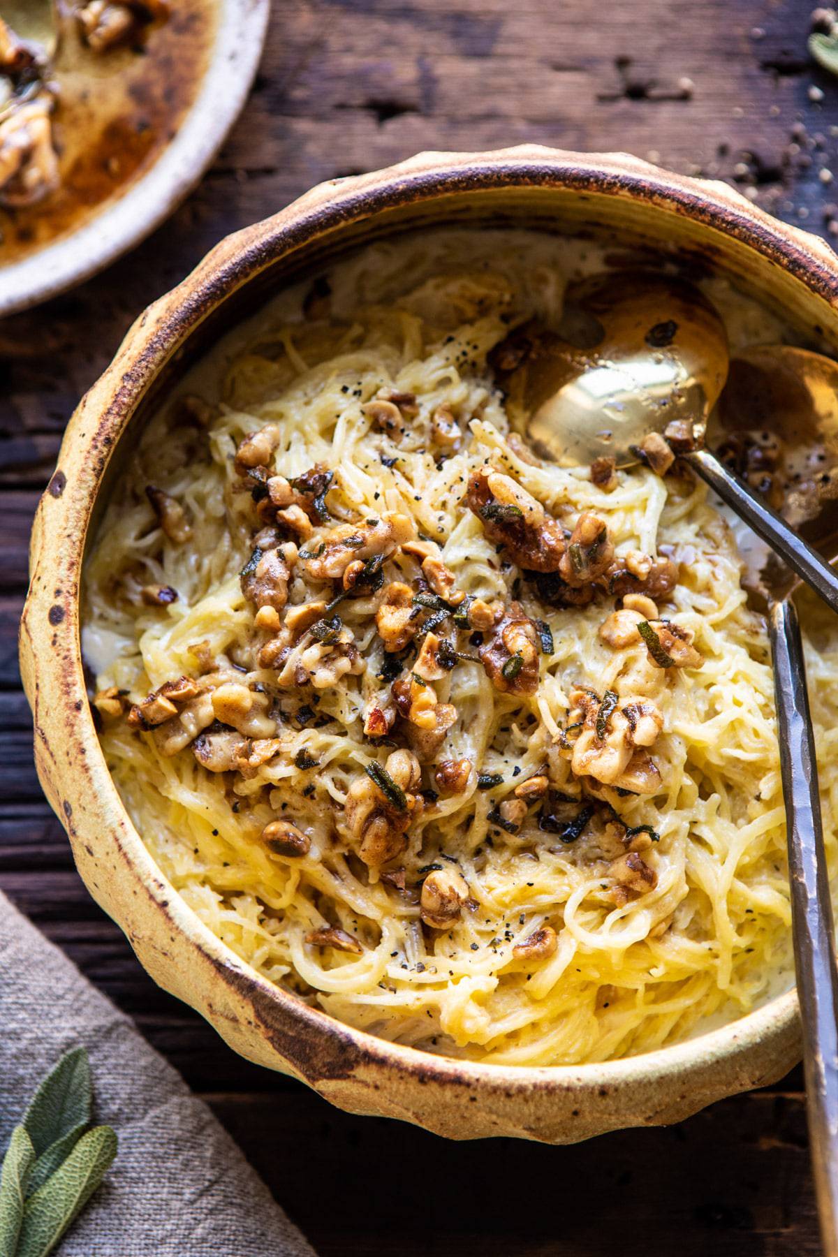 Creamed Spaghetti Squash with Browned Butter Walnuts | halfbakedharvest.com #spaghettisquash #healthy #thanksgiving #sage