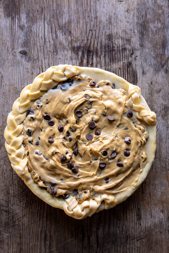 overhead photo of Gooey Chocolate Chip Cookie Pumpkin Pie before baking
