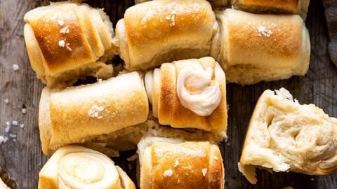 Salted Honey Butter Parker House Rolls | halfbakedharvest.com #rolls #thanksgiving #holidayrecipe