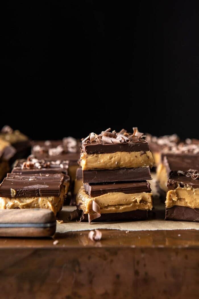 side angled photo of 5 Ingredient Triple Decker Chocolate Peanut Butter Bars 