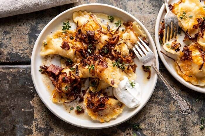 horizontal photo of Cheddar Pierogies with Caramelized Onions and Bacon 