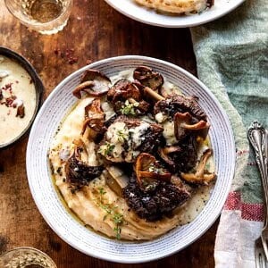 White Wine Braised Short Ribs with Buttered Mushroom Cream Sauce | halfbakedharvest.com #slowcooker #crockpot #shortribs #holiday #christmas