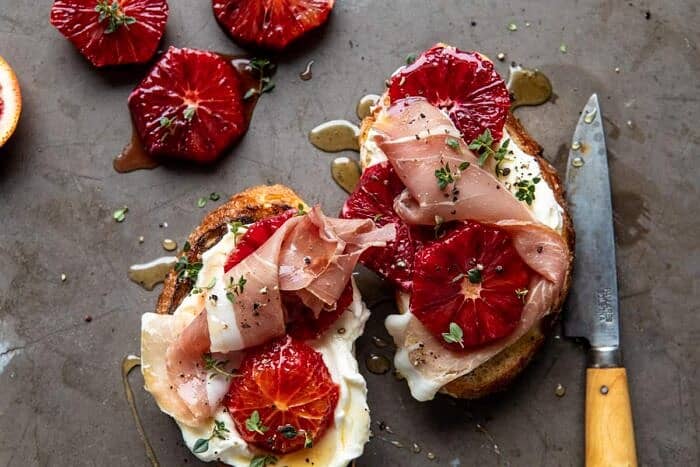 horizontal overhead photo of Simplest Whipped Ricotta Toast with Lemon Thyme Honey 