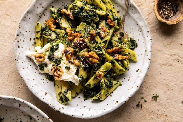 horizontal photo of Herby Kale Pesto Pasta with Buttery Walnuts