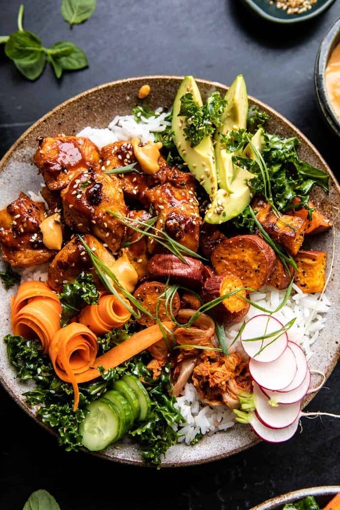 overhead close up photo of Sheet Pan Korean Chicken Bowl with Sweet Potatoes and Yum Yum Sauce 