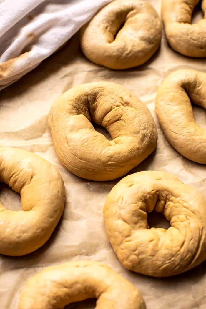 prep photo of bagels on baking sheet before boiling
