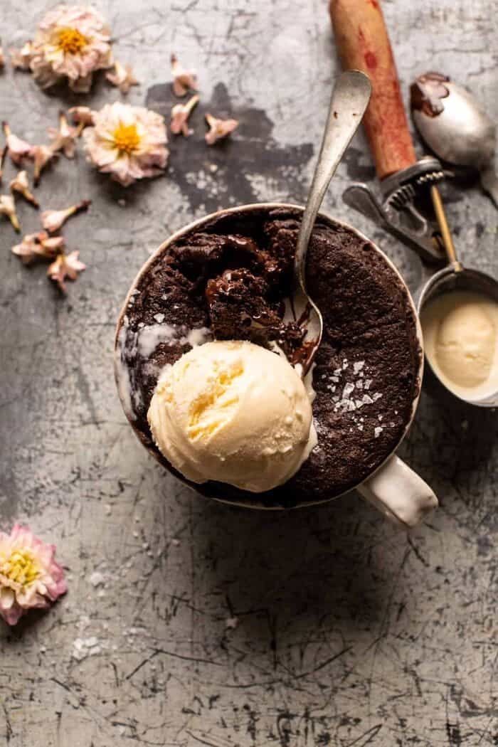 overhead photo of 5 Minute Molten Chocolate Mug Cake with ice cream 