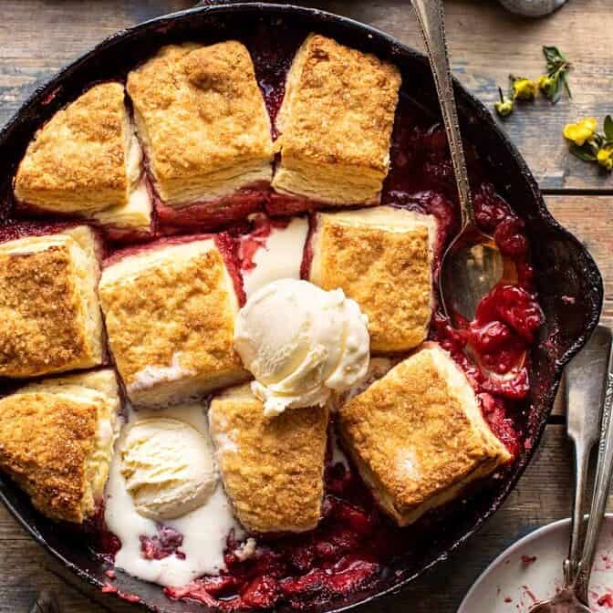 Skillet Strawberry Bourbon Cobbler with Layered Cream Cheese Biscuits | halfbakedharvest.com