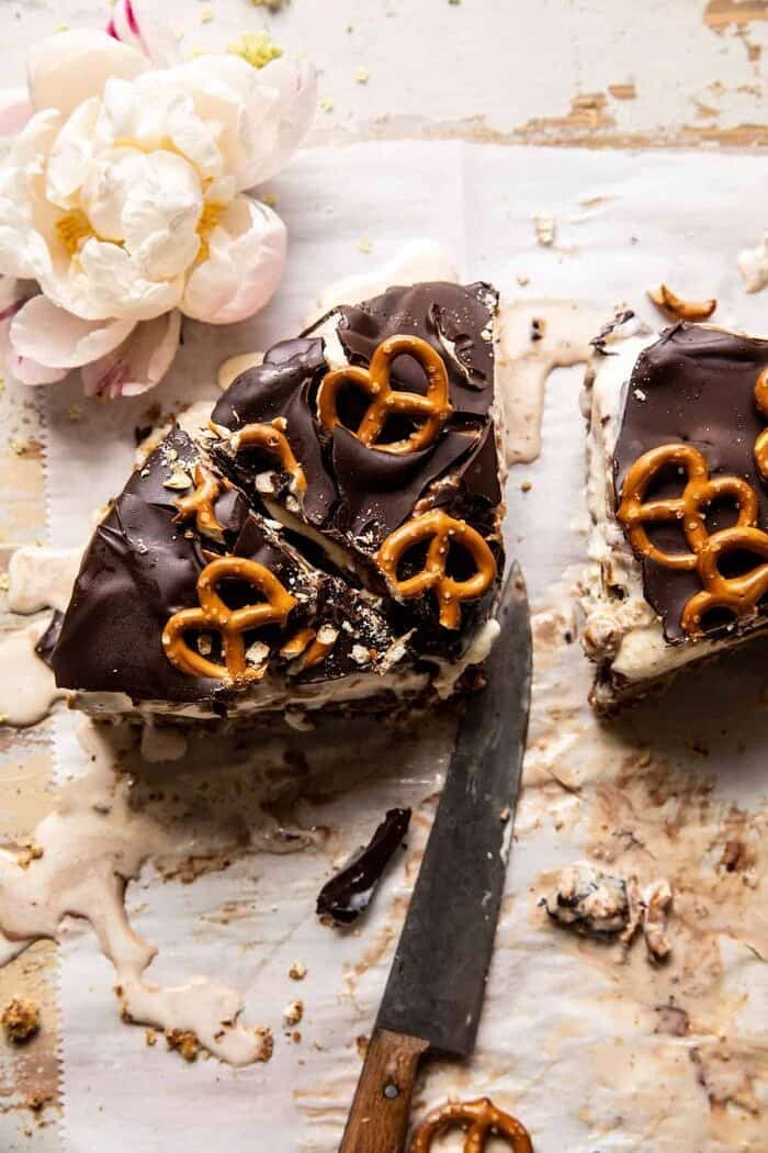 overhead photo of Fudgy Chocolate Peanut Butter Ice Cream Pretzel Cake slices 