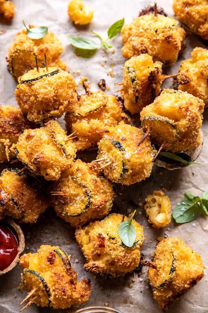 overhead close up photo of Mac and Cheese Stuffed Oven Fried Zucchini Bites | halfbakedharvest.com