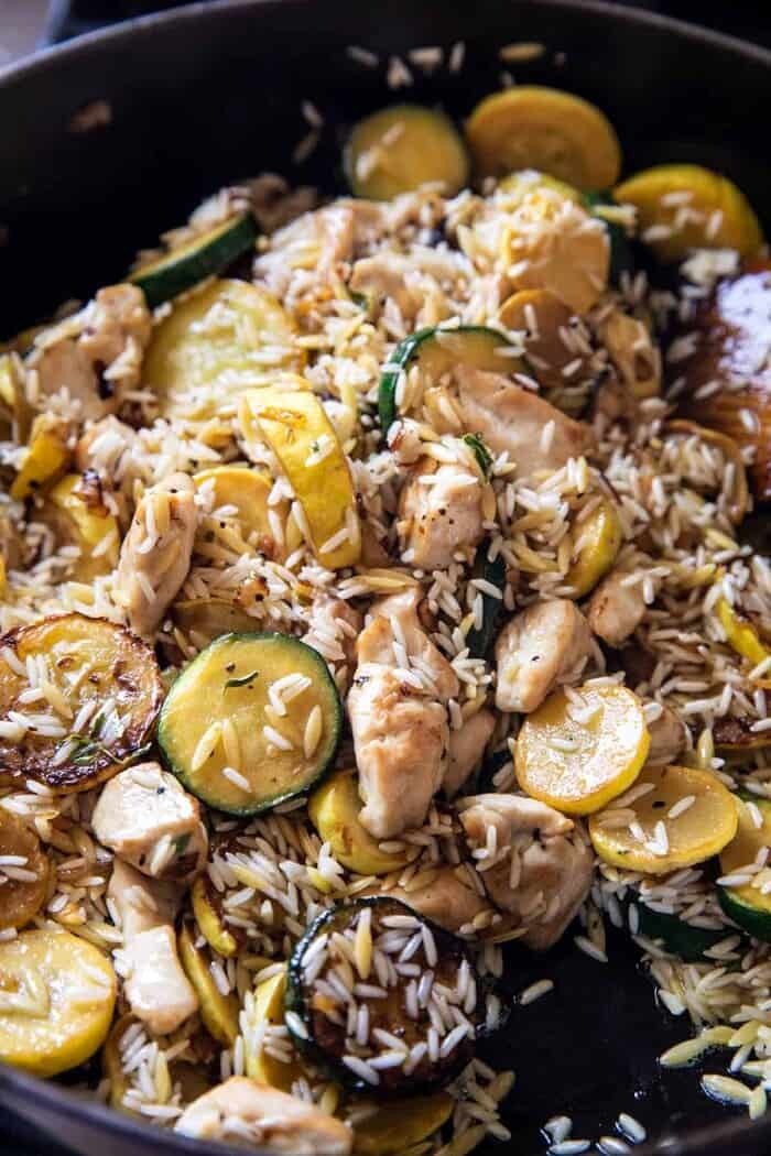 process photo of Zucchini Chicken and Rice in skillet while cooking