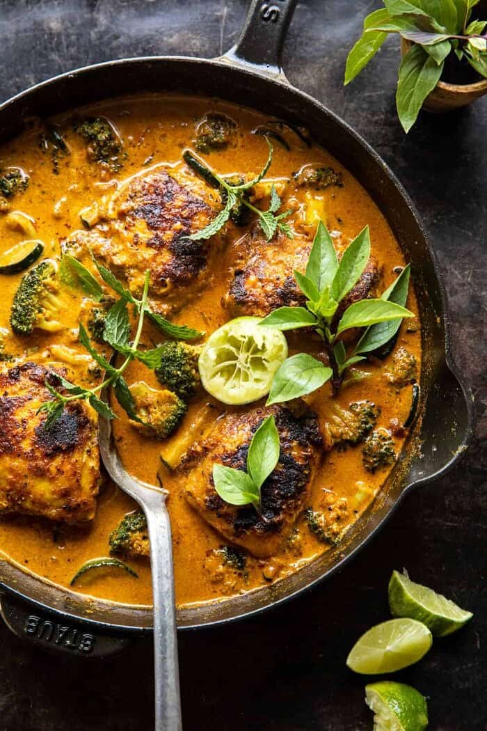 overhead photo of Saucy Coconut Braised Chicken with Broccoli in skillet