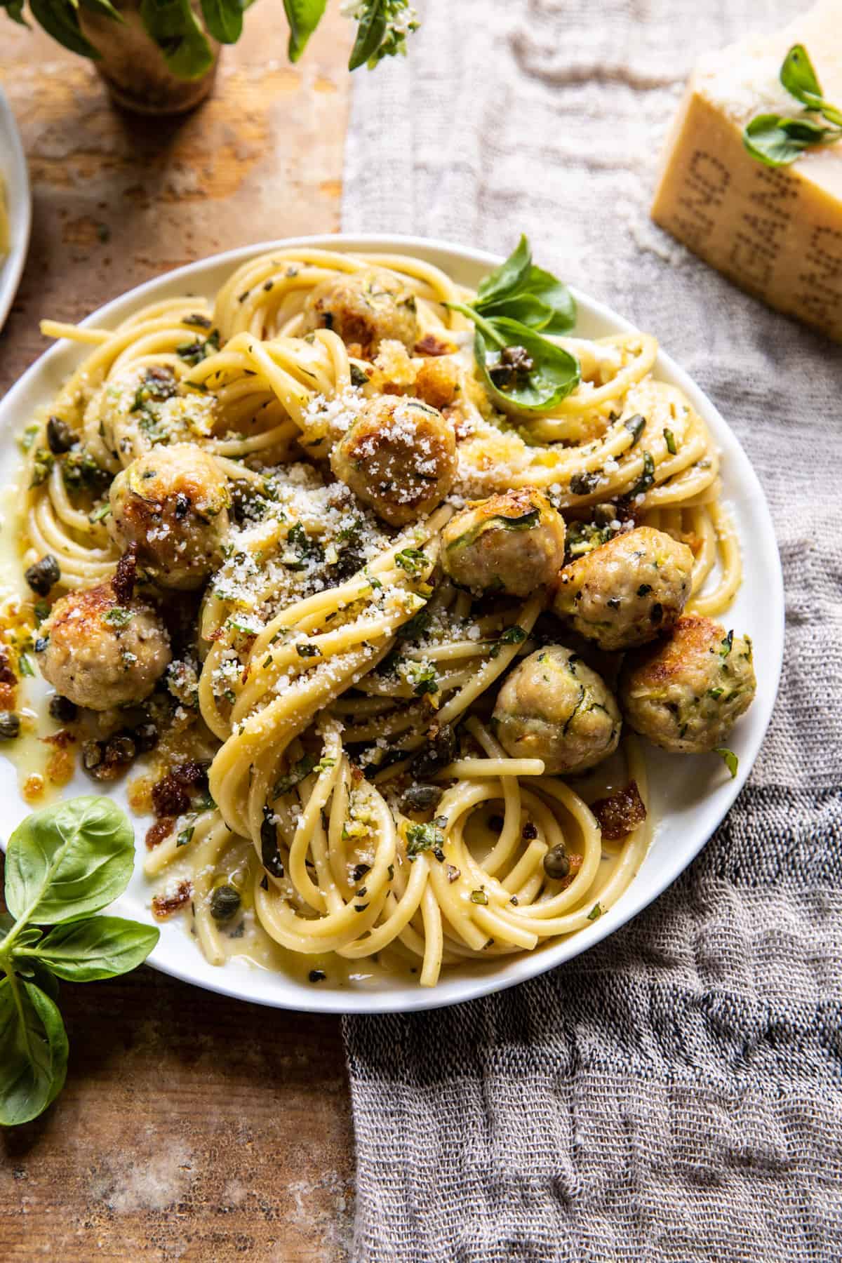 Zucchini Parmesan Chicken Meatballs with Lemon Pasta Carbonara. Half