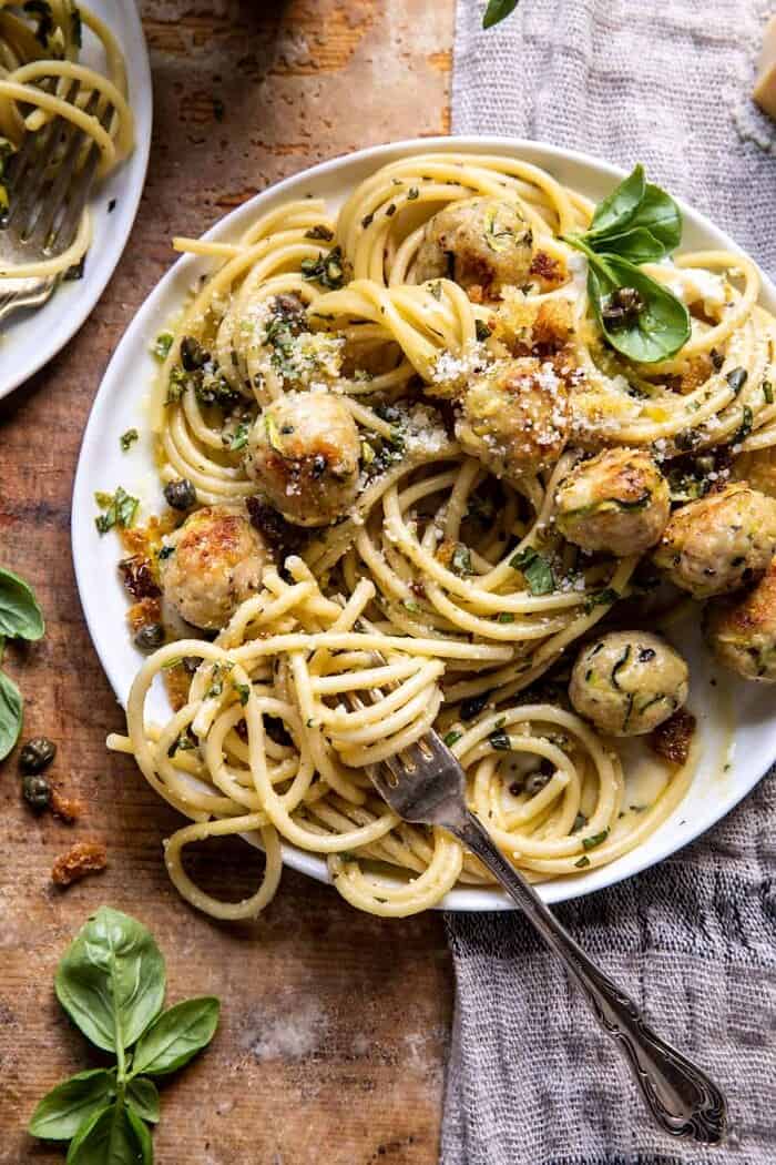 overhead photo of Zucchini Parmesan Chicken Meatballs with Lemon Pasta Carbonara 