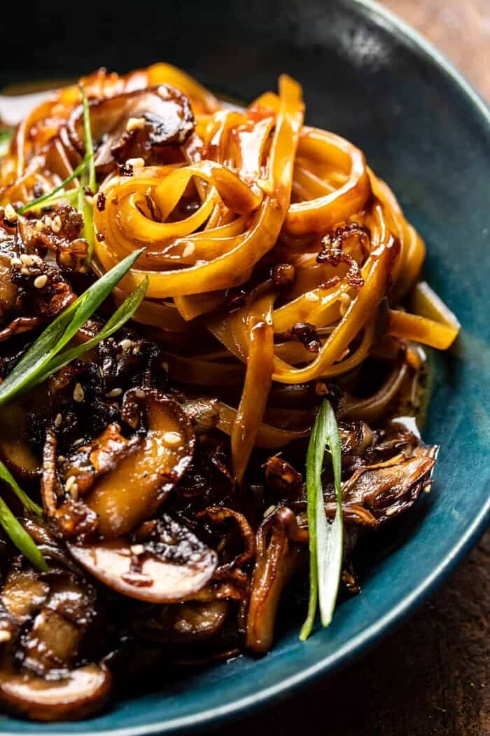 close up side angled photo of 30 Minute Saucy Ginger Sesame Noodles with Caramelized Mushrooms 