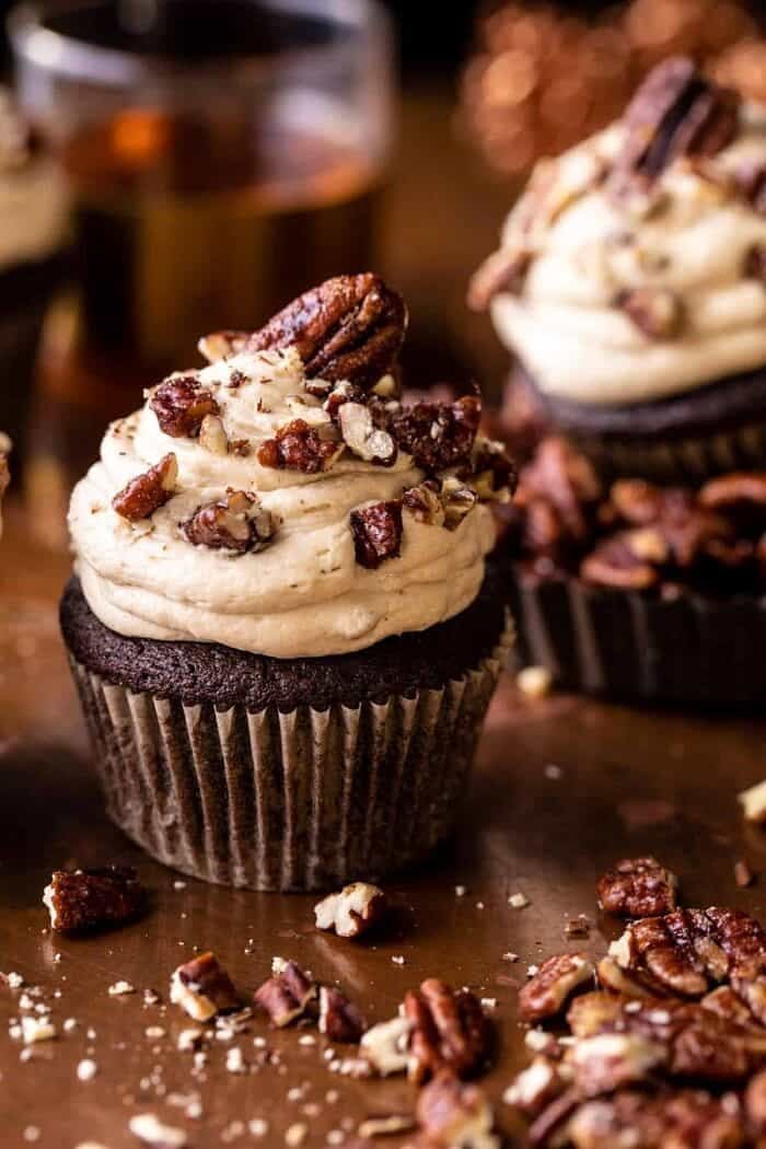 side angled photo Chocolate Bourbon Pecan Pie Cupcakes with Butter Pecan Frosting