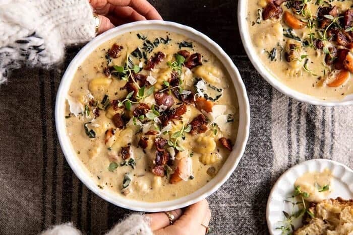 overhead horizontal photo of Creamy Gnocchi Soup with Rosemary Bacon