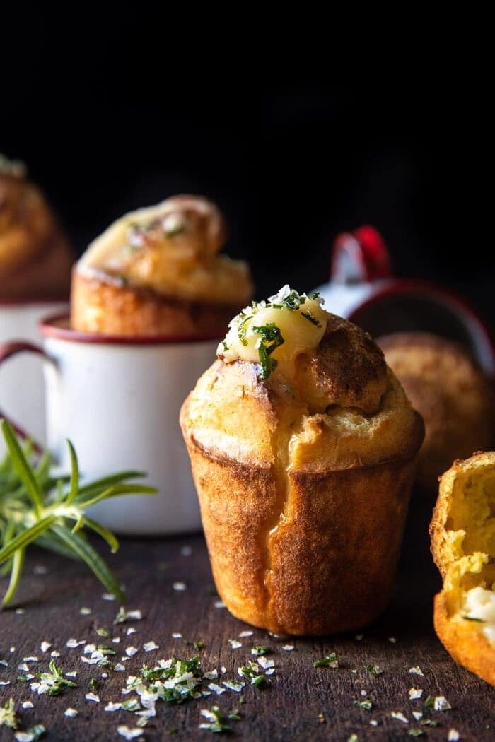 side angled photo of Salted Rosemary Popovers with Honey Butter 