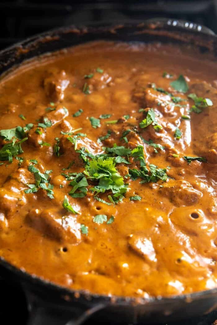30 Minute Spicy Indian Butter Chicken cooking in skillet 