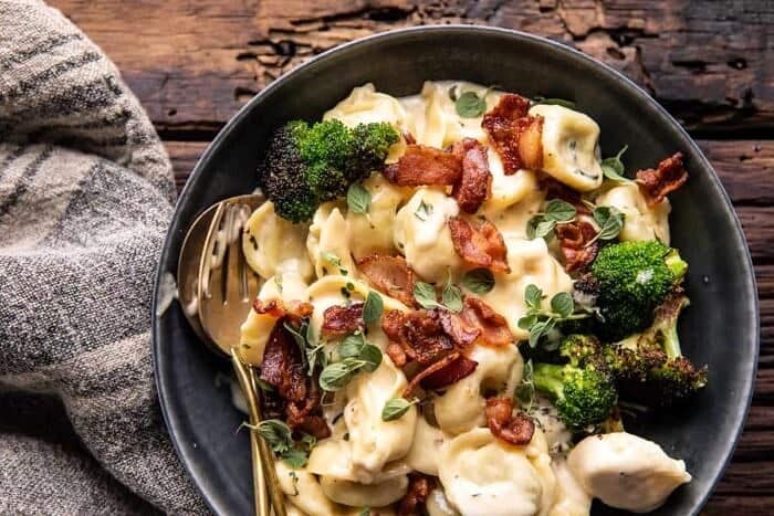 overhead horizontal photo of Creamy Bacon Tortellini with Charred Broccoli 