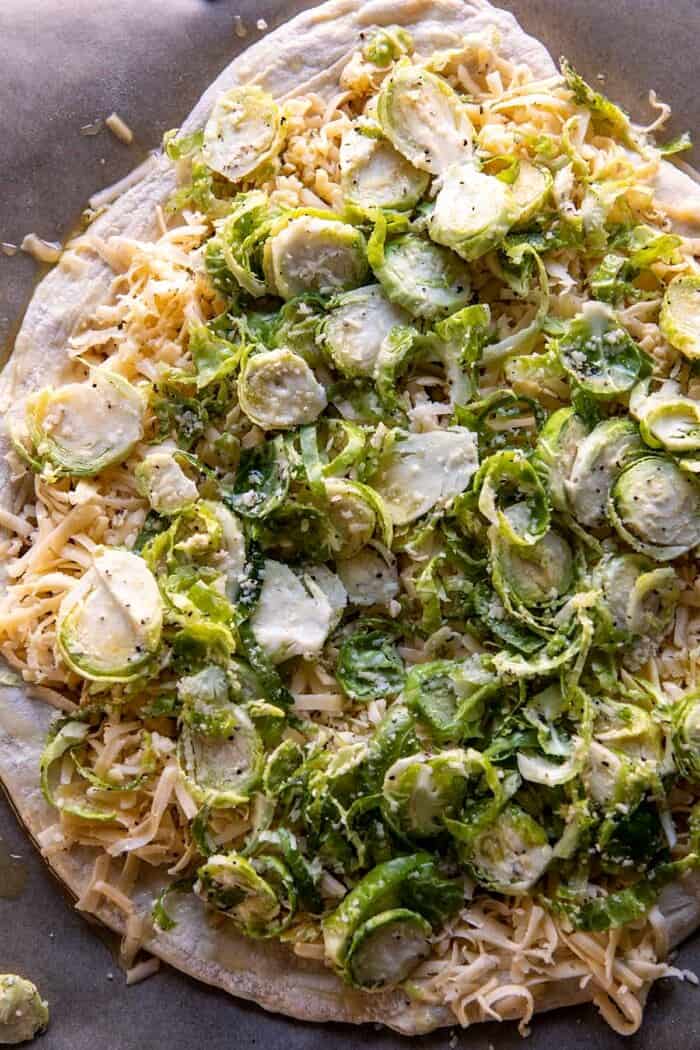 prep photo of Shredded Brussels Sprout and Bacon Pizza before cooking