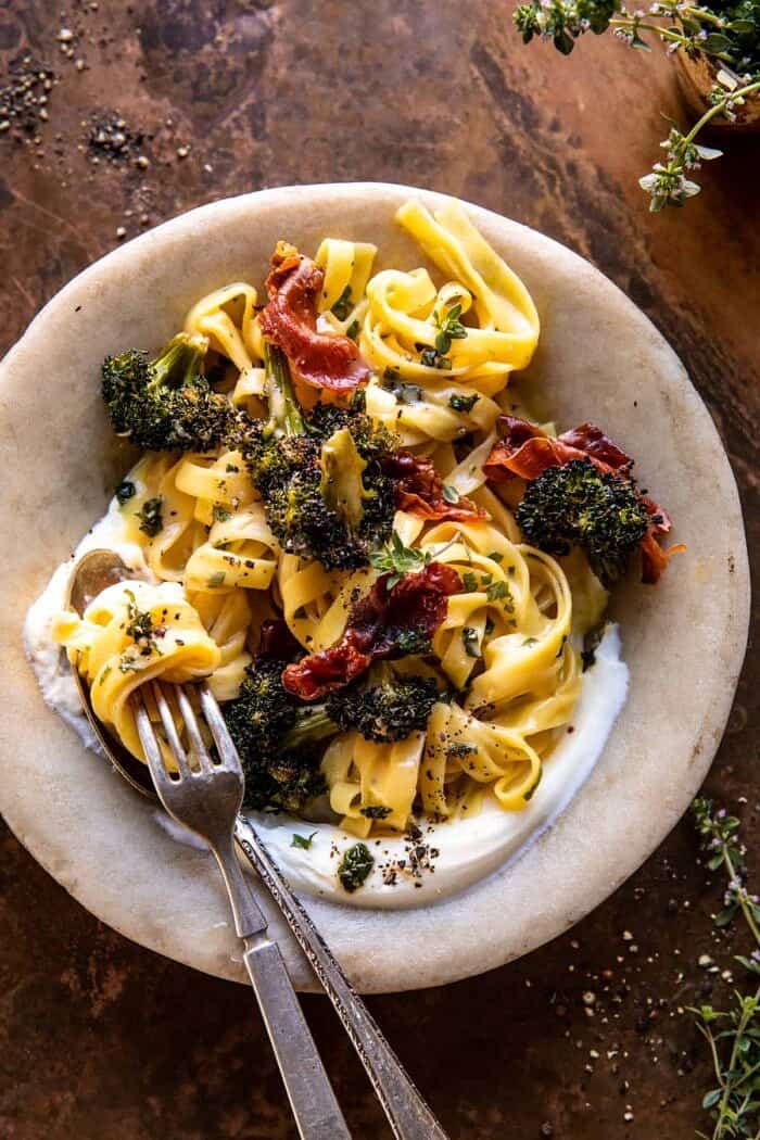 overhead photo of Roasted Broccoli Pasta Carbonara with Crispy Prosciutto and Whipped Ricotta