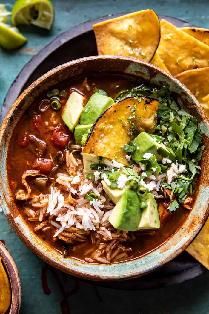 overhead close up photo of Slow Cooker Chipotle Chicken and Avocado Rice Soup