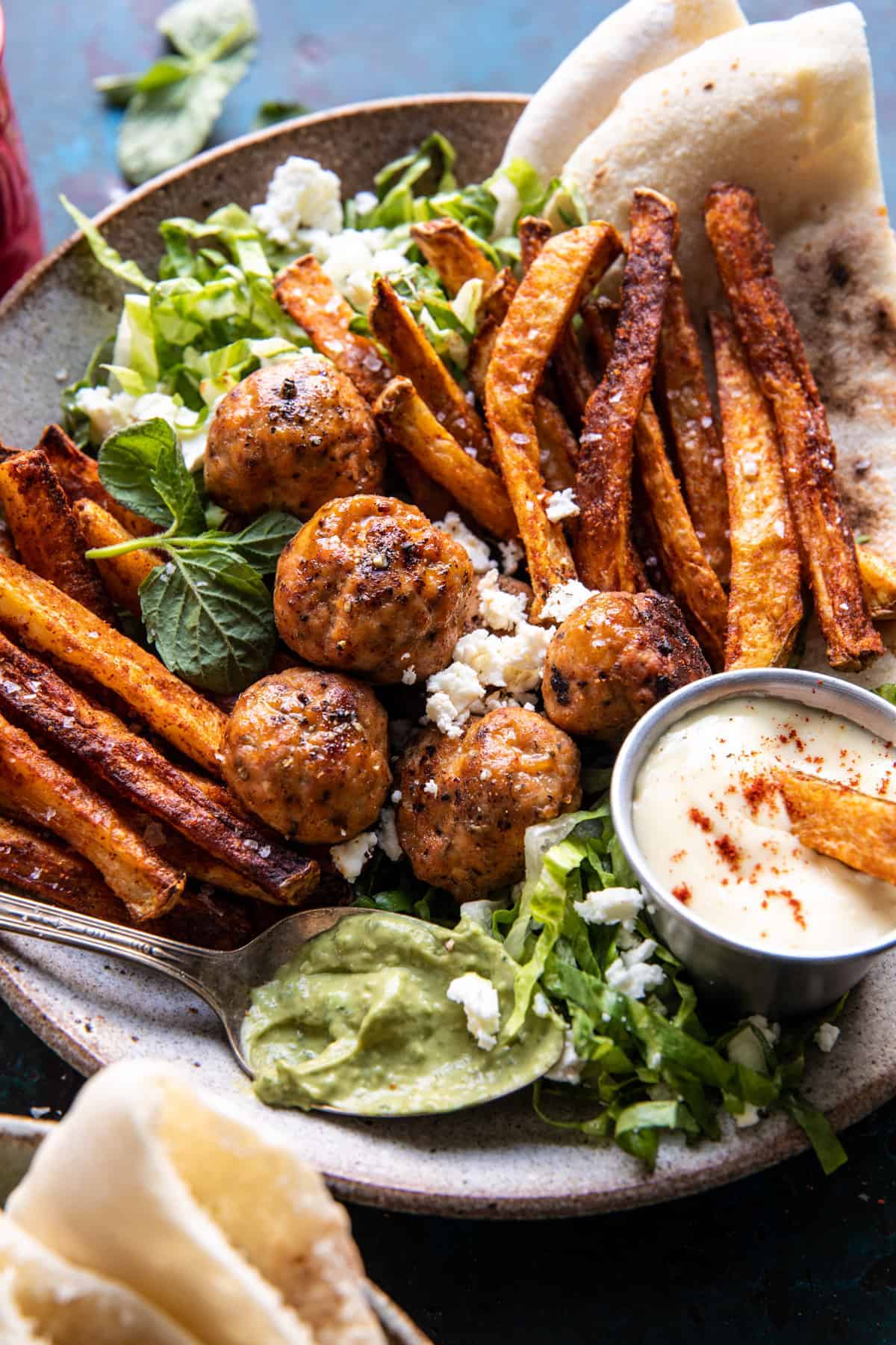 Chicken Meatball Pita Bowls with Seasoned Fries and Feta. Half Baked