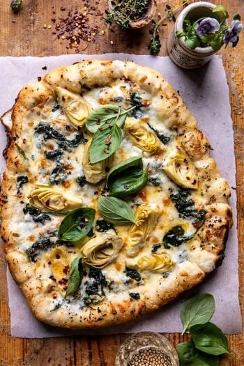 Spinach and Artichoke Pizza with Cheesy Bread Crust. - Half Baked Harvest