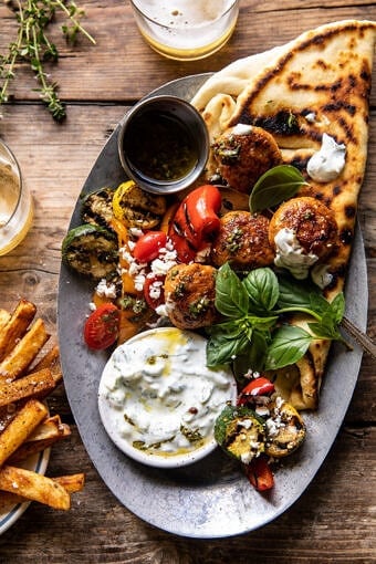 Spicy Oregano Meatballs with Grilled Vegetables and Tzatziki | halfbakedharvest.com