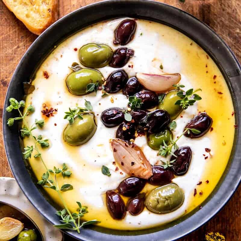Honey Whipped Feta with Garlic Herb Roasted Olives | halfbakedharvest.com