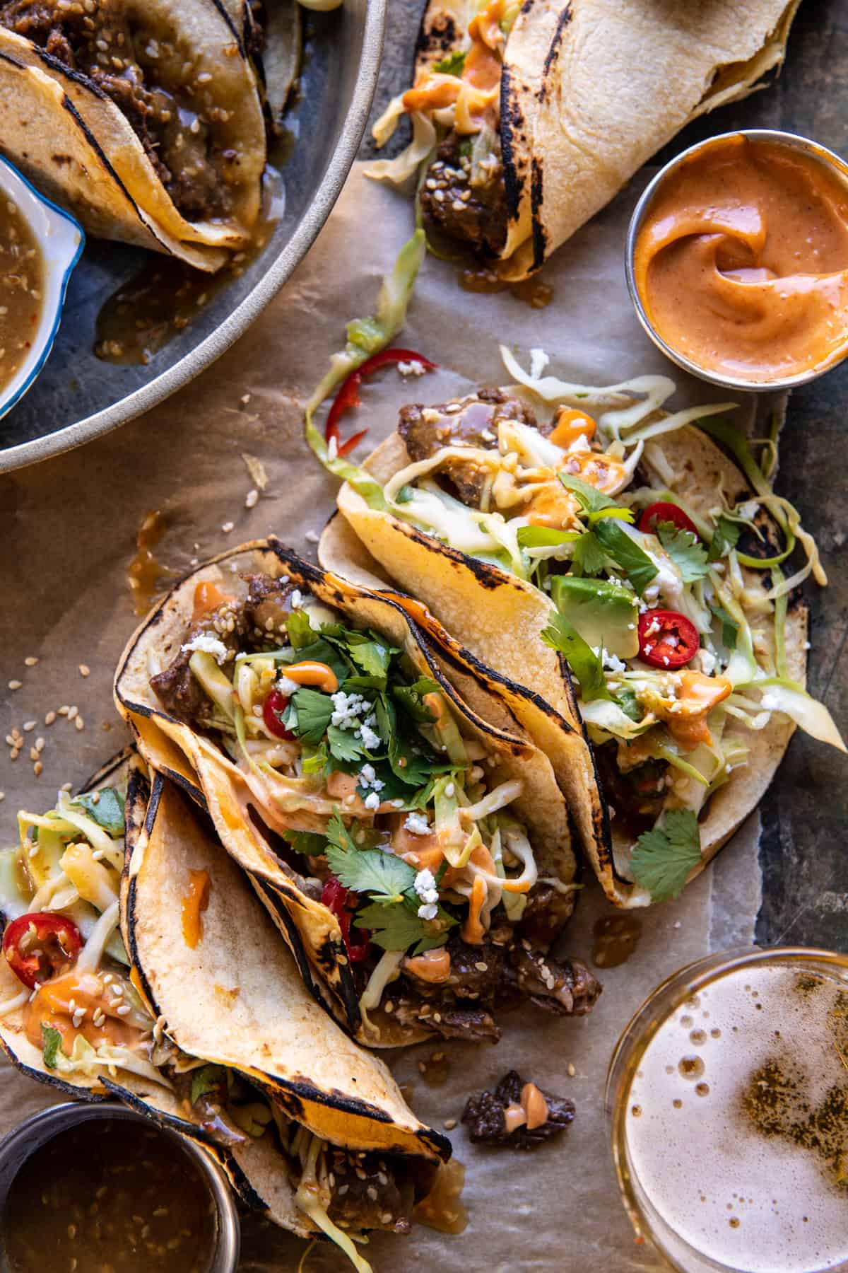 Crockpot Korean Inspired Tacos with Yum Yum Yummm Sauce | halfbakedharvest.com