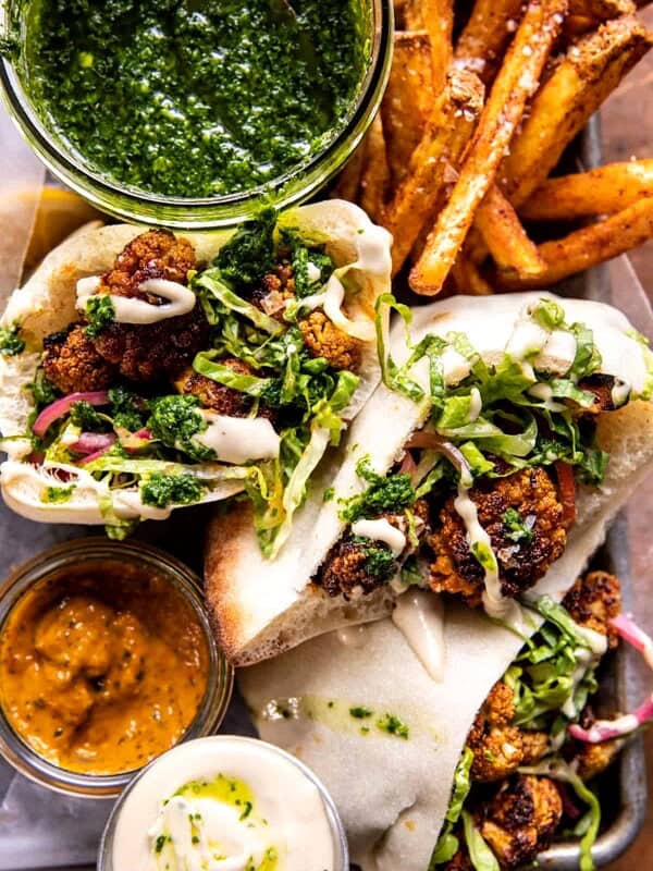 Roasted Cauliflower Pitas with Zhug and Garlic Tahini | halfbakedharvest.com