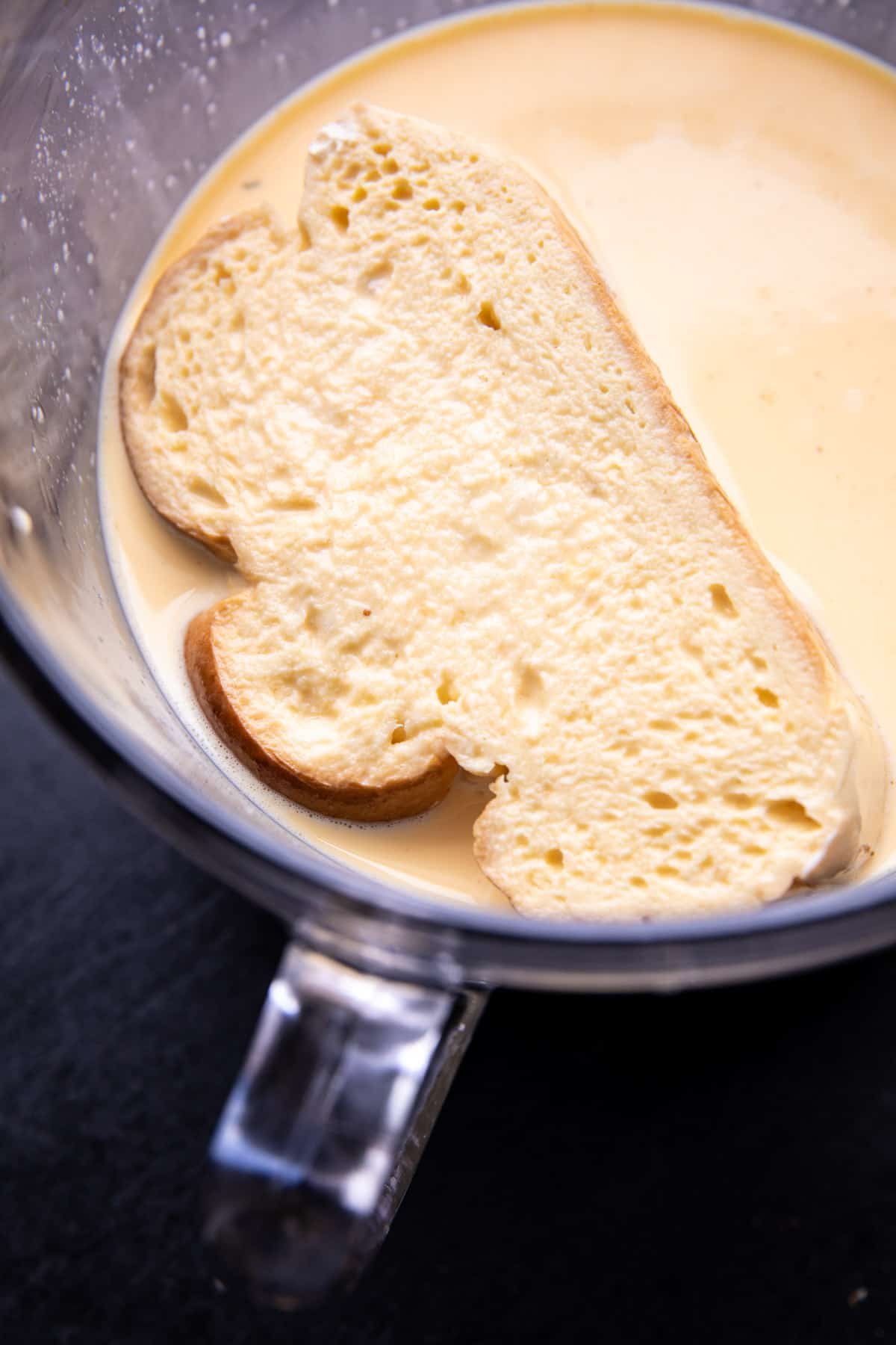 prep photo of the bread in the egg custard batter 