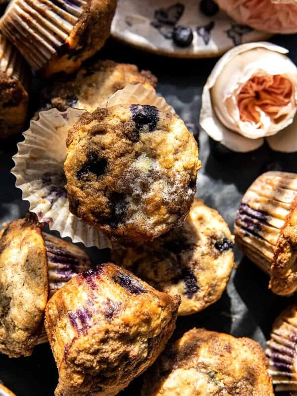 overhead photo of muffins with butter melting over warm muffin