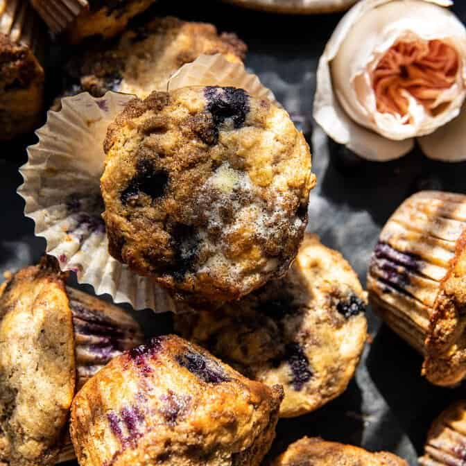 overhead photo of muffins with butter melting over warm muffin