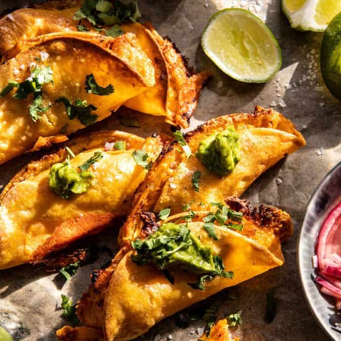 Crockpot Crispy Chicken Tinga Tacos with Avocado Jalapeño Crema | halfbakedharvest.com
