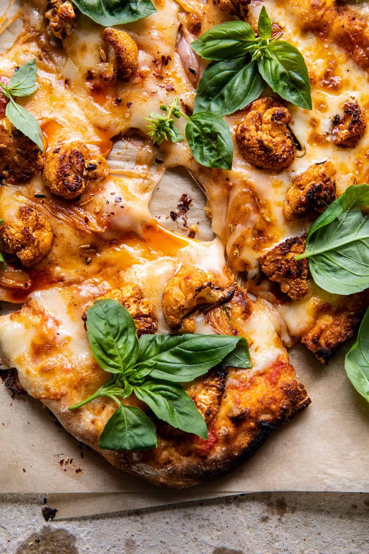 close up, overhead photo of Cauliflower Pepperoni Cheese Pizza slice