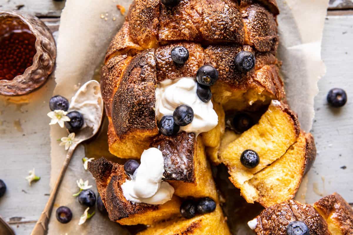 Pull Apart French Toast Bake with spoonful of whipped cream