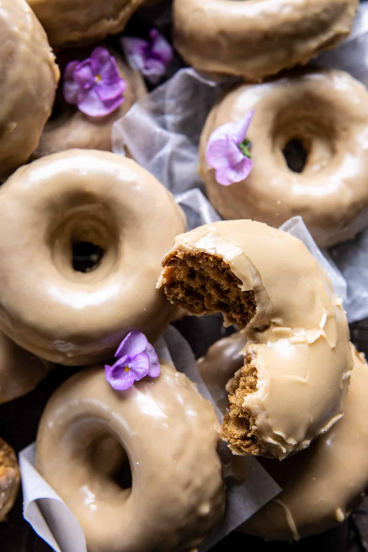 close up photo of half eaten doughnut 